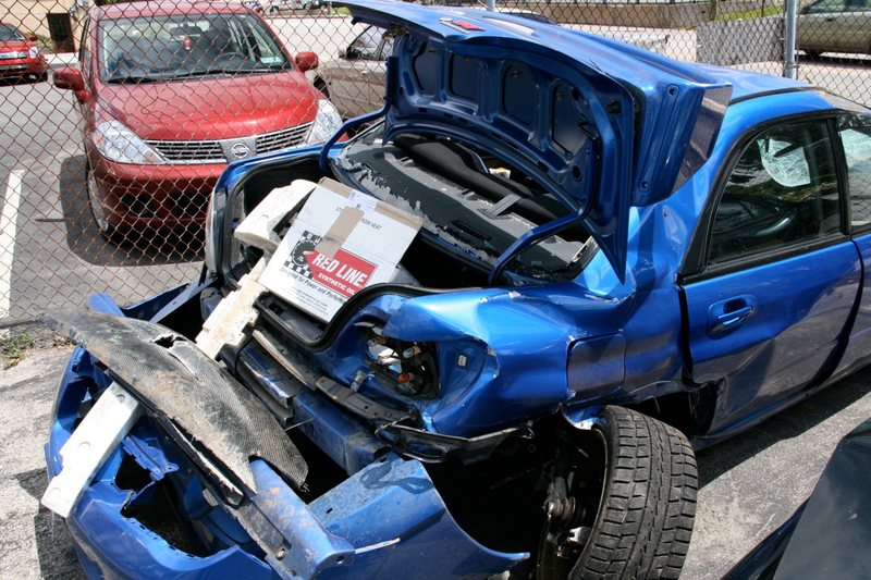 Illustration for article titled Subaru STI Hits Two Trees At Speed, Flips Twice, Everyone Survives!